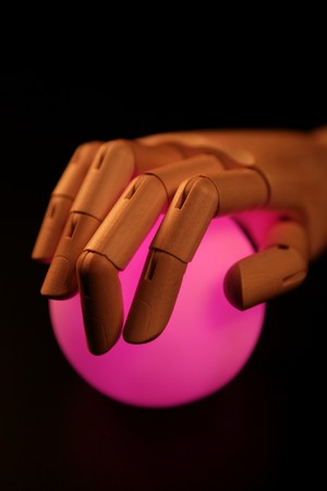 Wooden mannequin hand, ball of light, fortune teller, adivinationの写真素材