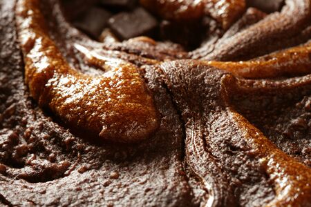 Chocolate cake crop macro texture, golden light, studio shotの写真素材