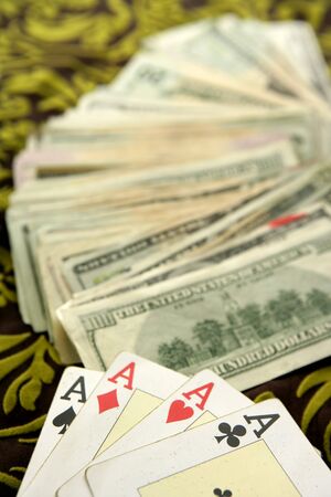 dollar notes and poker cards, gambler tools recreationの写真素材