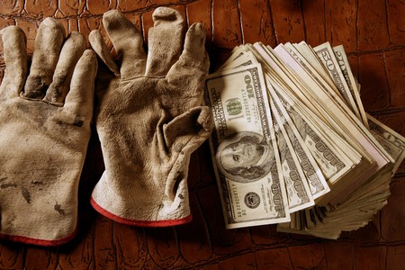 Cleaning black money dollar metaphor, dirty gloves