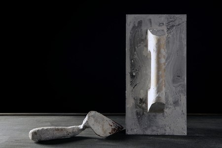 Hardware construction hand used dirty tools, studio over dark black woodの写真素材