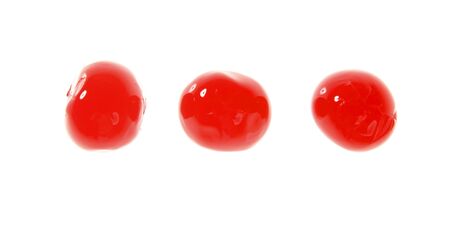 three cherry red fruits macro isolated over white backgroundの写真素材