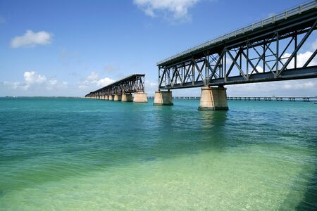 old Florida keys broken bridge over turquoise waterの写真素材