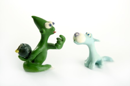 two friends joke treason with hidden hand bomb, plasticine toysの写真素材