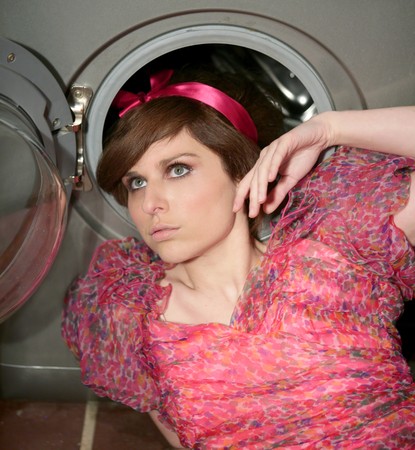 funny young woman housewife, kitchen fashion metaphorの写真素材