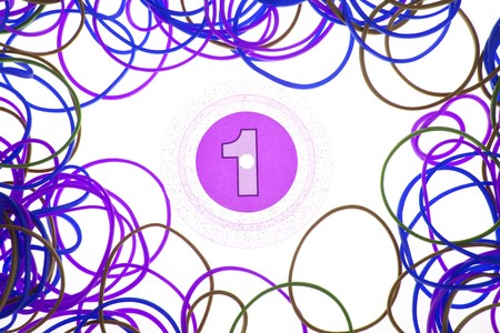 Colorful texture of rubber bands and disks with numbers