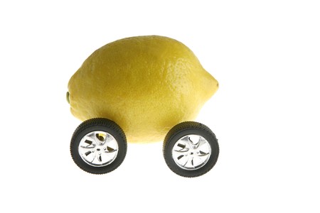 Ecological transport metaphor, clean energy, lemon and wheelsの写真素材