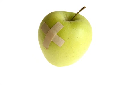 Genetically modified foods, with bandage after hurtの写真素材