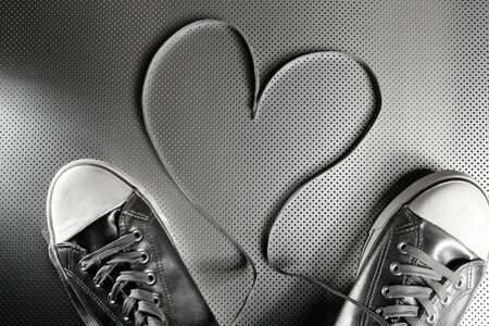 Laces of silver shoes, threads with heart valentines shapeの写真素材