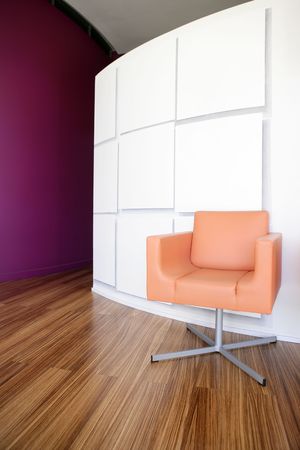 Modern office lobby interior design, orange leather chair , wooden floorの写真素材