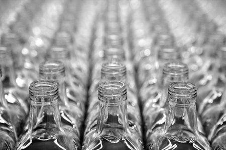 Glass square transparent bottles, factory lines and rowsの写真素材