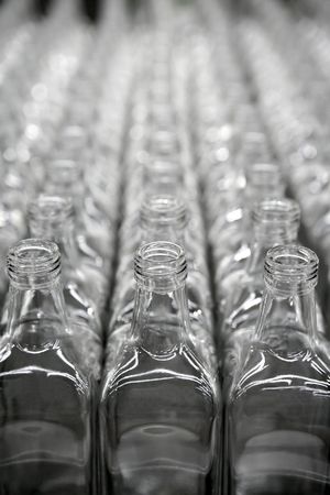 Glass square transparent bottles, factory lines and rowsの写真素材