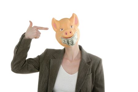 Funny businesswoman with swine face and dollar note maskの写真素材