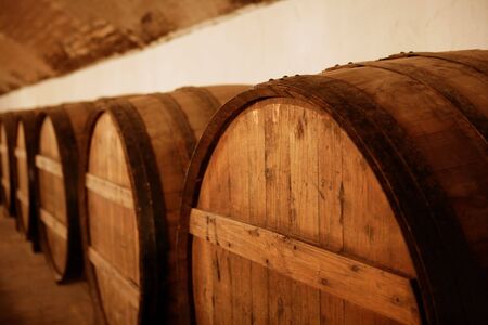 natural wood wine golden barrel cellar in Spainの写真素材