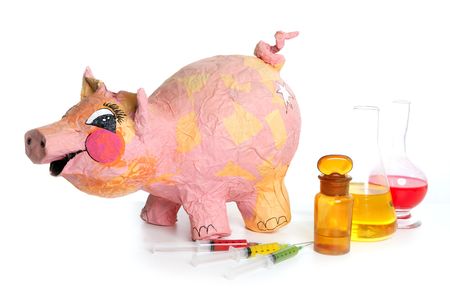 Beautiful little pink pig with medicine, swine AH1N1 flu metaphorの写真素材