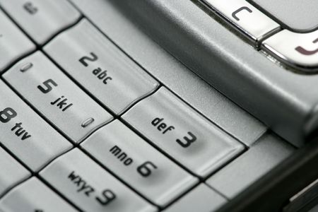 Mobile phone macro keyboard detail, electronics closeupの写真素材