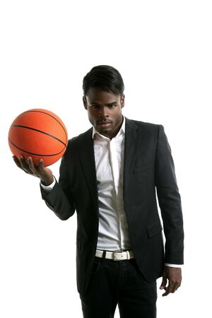 African american young businessman basketball ball in white studioの写真素材