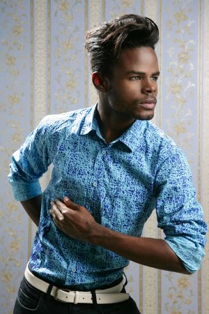 African american fashion model portrait on blue wallpaper backgroundの写真素材