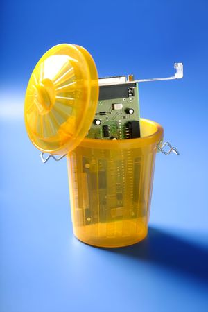 technology circuit on the trash, electronic tech metaphorの写真素材