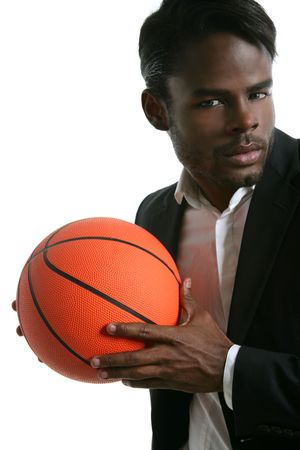 African american young businessman basketball ball in white studioの写真素材