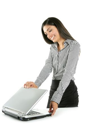 Beautiful indian brunette businesswoman with laptop computer isolated on whiteの写真素材