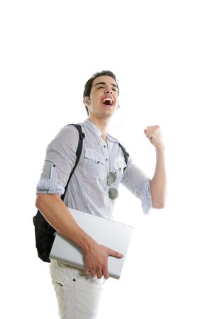 Happy student positive gesture with laptop computer isolated on whiteの写真素材