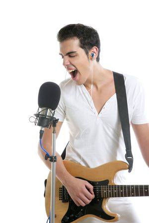 Musician young man playing electric guitar isolated on whiteの写真素材