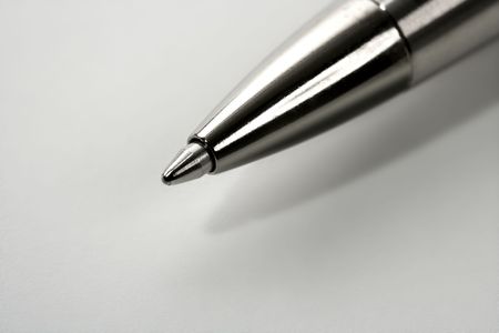 Macro roller silver gray pen point over white backgroundの写真素材