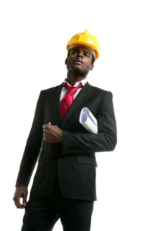 African american architect engineer with yellow hardhat and plansの写真素材