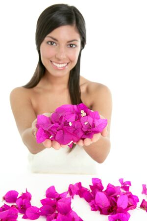 Beautiful indian woman portrait with bougainvilleas flowers over whiteの写真素材