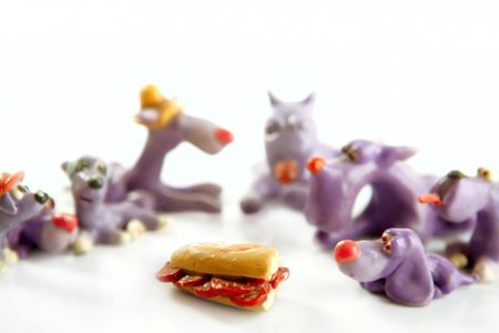 Dogs meeting hungry for eating the meat salami slices sandwich
