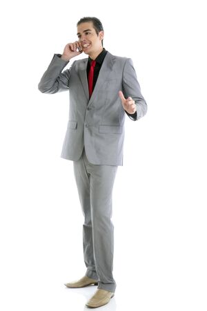 Businessman young full body talking phone isolated on whiteの写真素材