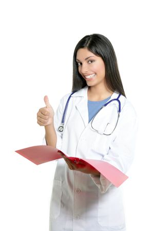 Berautiful brunette indian young happy doctor woman isolated on whiteの写真素材