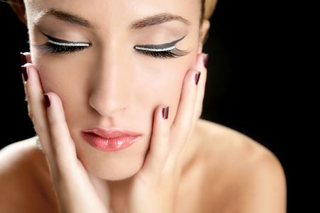 Beautiful fashion woman thinking expression over black backgroundの写真素材