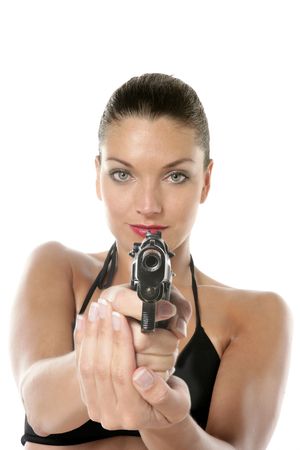 Beautiful sexy bikini woman with black gun isolated on white