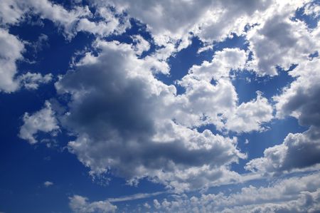 Blue beautiful sky with white clouds view in sunny dayの写真素材