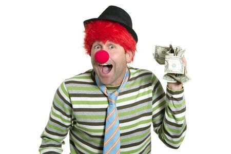 Clown with many dollar currency notes in hand humor funny businessの写真素材