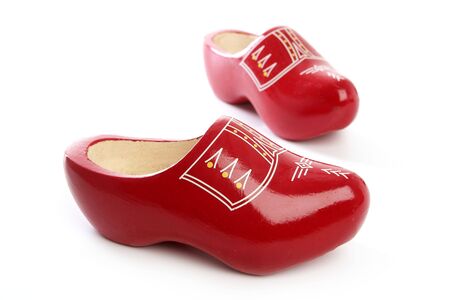 Dutch Holland red wooden shoes isolated on white studio background