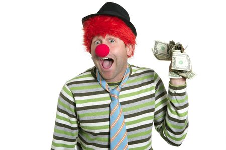 Clown with many dollar currency notes in hand humor funny businessの写真素材