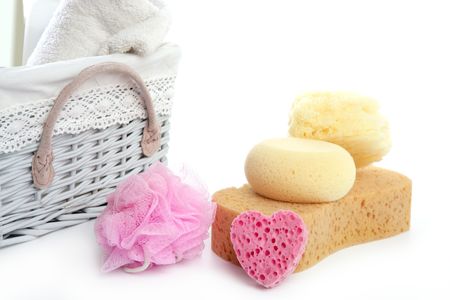 Toiletries stuff sponge gel shampoo and bath towels on white backgroundの写真素材