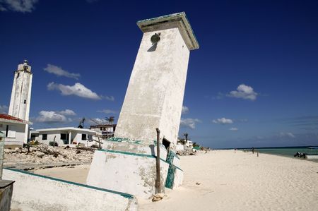 Puerto Morelos Mexico white inclined lighthouse by hurricane storm  の写真素材