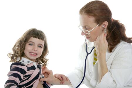 Pediatrician woman doctor stethoscope medical exam little girlの写真素材