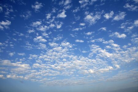 Blue sky white clouds in a summer clean day, texture