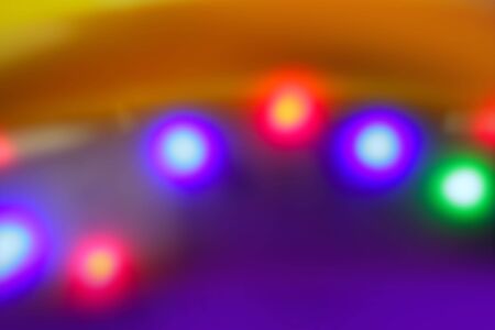 Blurred colorful disco dancing vivid night lights blur background