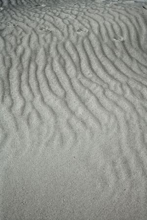sand waves testure on white sands like desert の写真素材