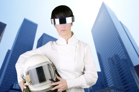 futuristic spaceship aircraft astronaut helmet woman modern skyscraper mirror city buildingsの写真素材
