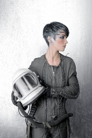 fashion silver woman spaceship astronaut helmet space metaphorの写真素材