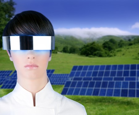 silver futuristic glasses woman solar plates in meadow outdoorの写真素材