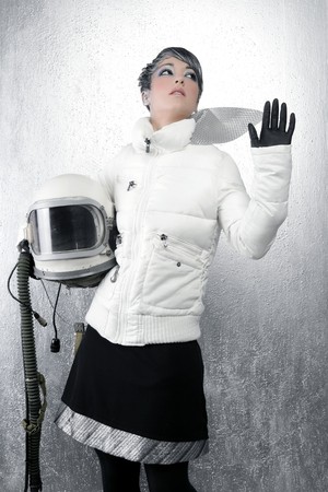 astronaut spaceship driver aircraft helmet fashion woman over silverの写真素材