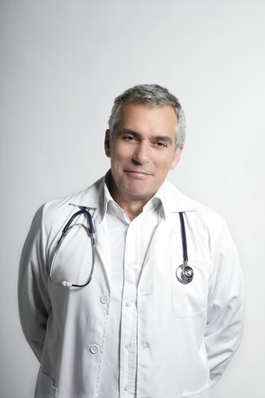 expertise doctor senior gray hair smiling portraitの写真素材